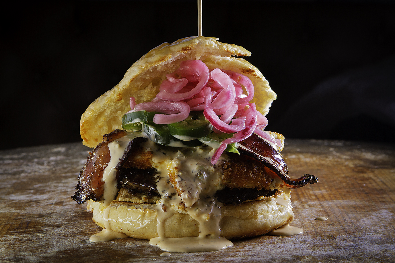The Diablo Burger at Muck & Fuss, a signature burger featuring jalap